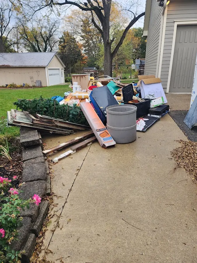 Dumpster being loaded with debris for 30 Yard Dumpster Rental in York